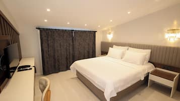 Comfort Double Room, City View | In-room safe, desk, laptop workspace, blackout drapes