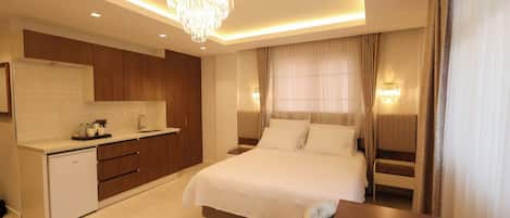 Comfort Double Room, City View | In-room safe, desk, laptop workspace, blackout drapes