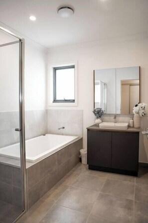 Shower, hair dryer, towels