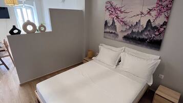 1 dormitorio, tabla de planchar con plancha, wifi y ropa de cama