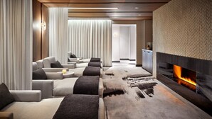 A modern lounge area with sofas and a fireplace. - Zetapark Condominium by Emily in Town (Kuala Lumpur)