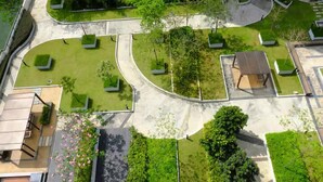An aerial view of a landscaped area with pathways, green spaces, and a small pavilion. - Zetapark Condominium by Emily in Town (Kuala Lumpur)