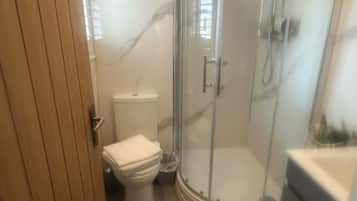 Hair dryer, towels, soap, toilet paper