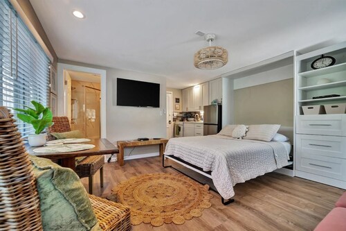 Scenic Water-View Condo with Heated Pool, Steps from the Beach