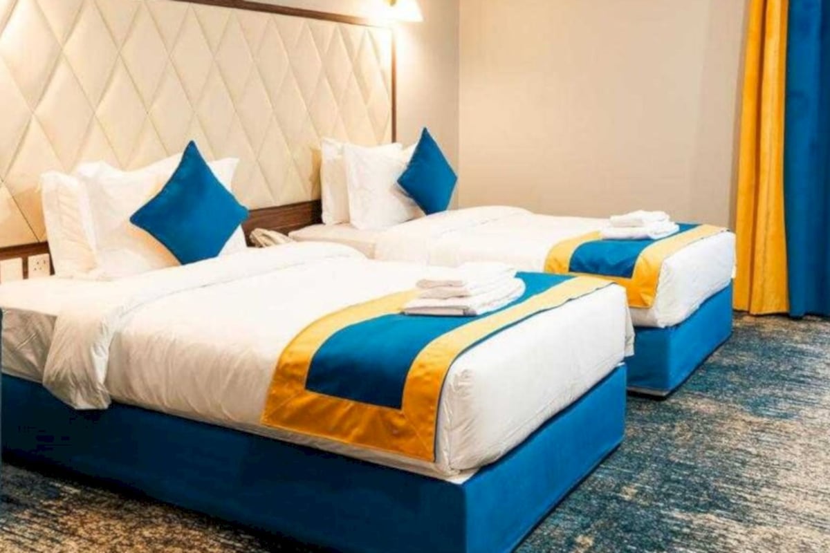 Desk, laptop workspace, free WiFi, bed sheets