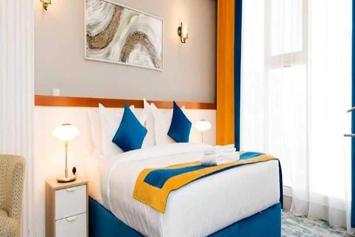 Desk, laptop workspace, free WiFi, bed sheets