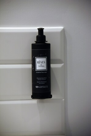 Shower, towels, soap, shampoo