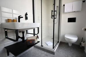 Shower, towels, soap, shampoo