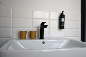 Shower, towels, soap, shampoo