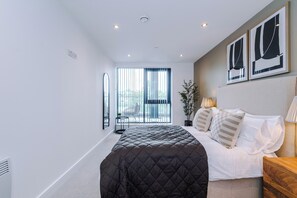 2 chambres, fer et planche à repasser, Wi-Fi, draps fournis