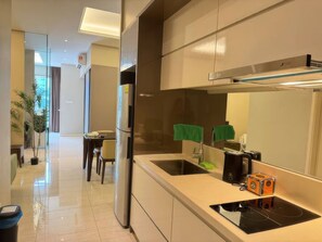 Superior Apartment, 2 Bedrooms, Balcony, City View | Private kitchen | Fridge, microwave, stovetop, cookware/dishes/utensils - Dorsett Hartamas SkyPool & Chill (Kuala Lumpur)