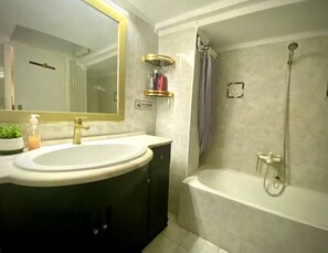 Hair dryer, towels, soap, toilet paper
