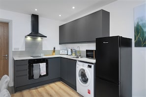 Departamento, 1 cama matrimonial | Cocina privada | Microondas, horno, parrilla de estufa y tostadora