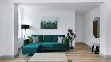 Apartment, 1 King Bed | Living area | 43-inch Smart TV with digital channels