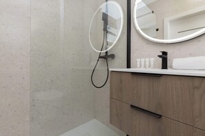 Shower, free toiletries, hair dryer, towels