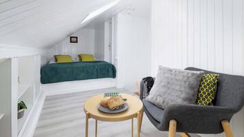 1 habitación, tabla de planchar con plancha, cuna de viaje y wifi