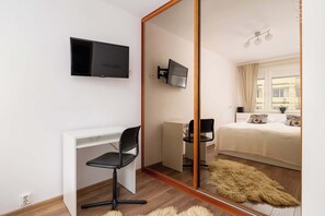 2 bedrooms, desk, iron/ironing board, travel cot