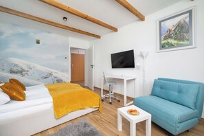 1 bedroom, desk, iron/ironing board, travel crib