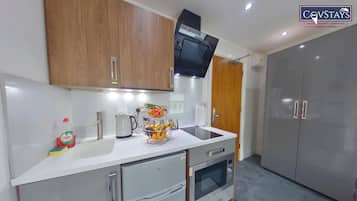 Superior Studio | Private kitchen | Fridge, microwave, oven, stovetop