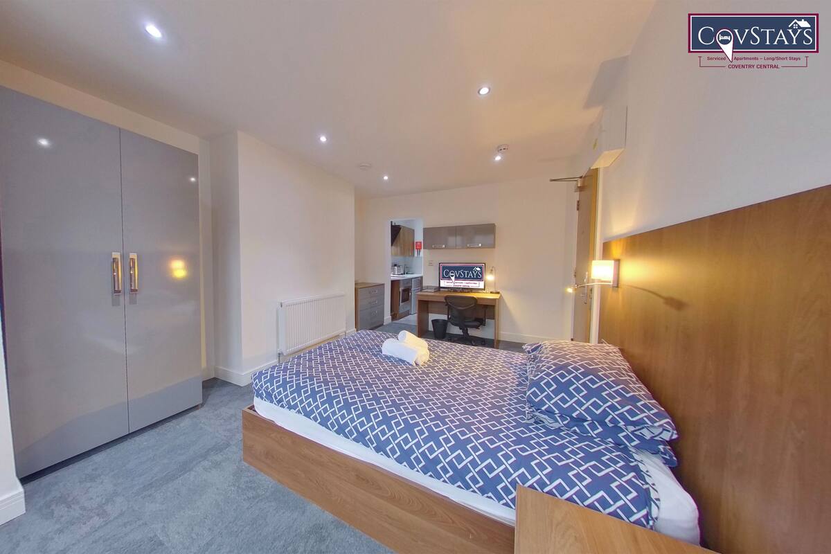 Premium bedding, down comforters, desk, laptop workspace