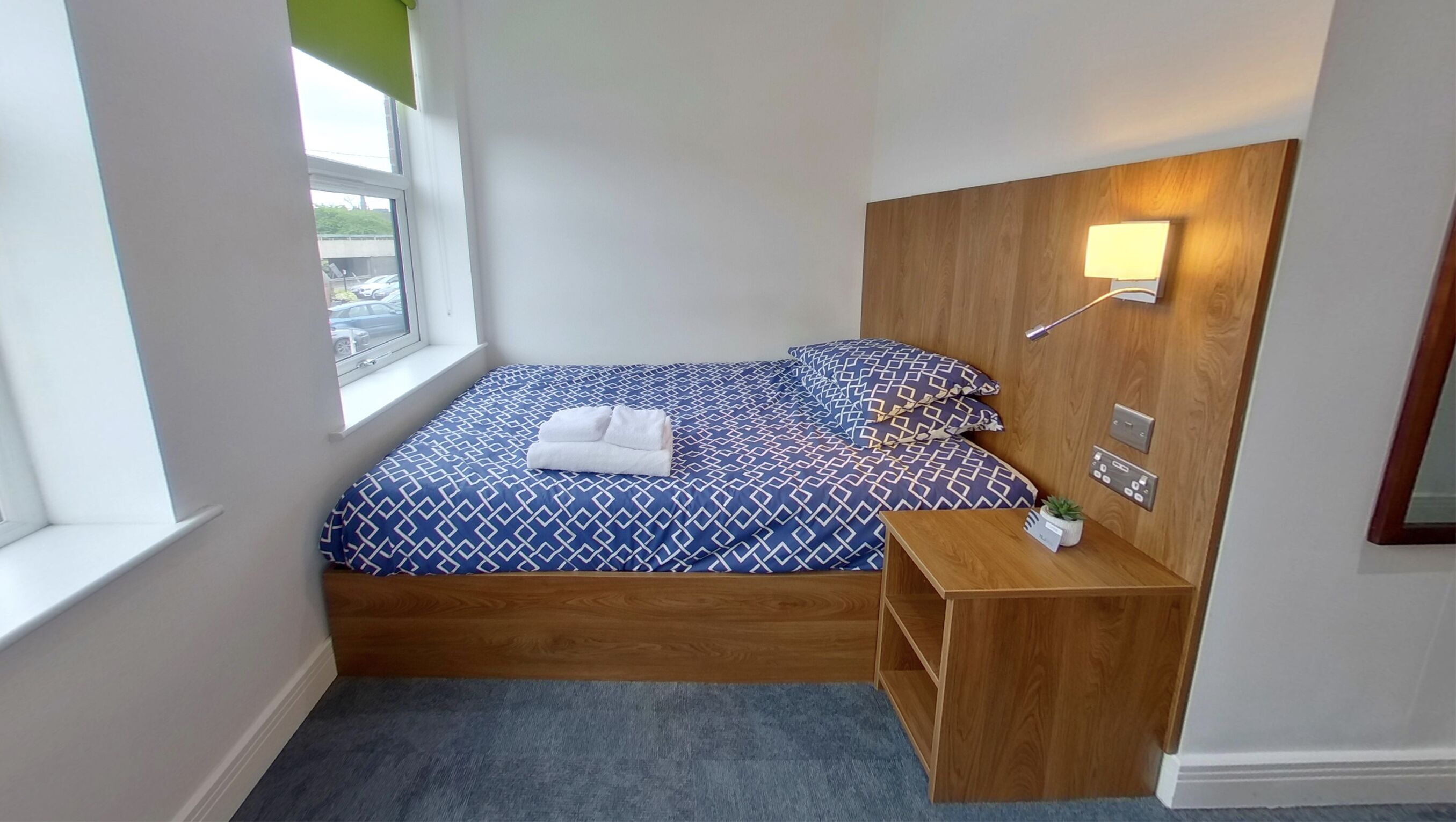 Standard Studio | Premium bedding, down comforters, desk, laptop workspace