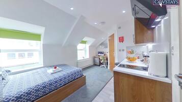 Superior Studio | Premium bedding, down comforters, desk, laptop workspace