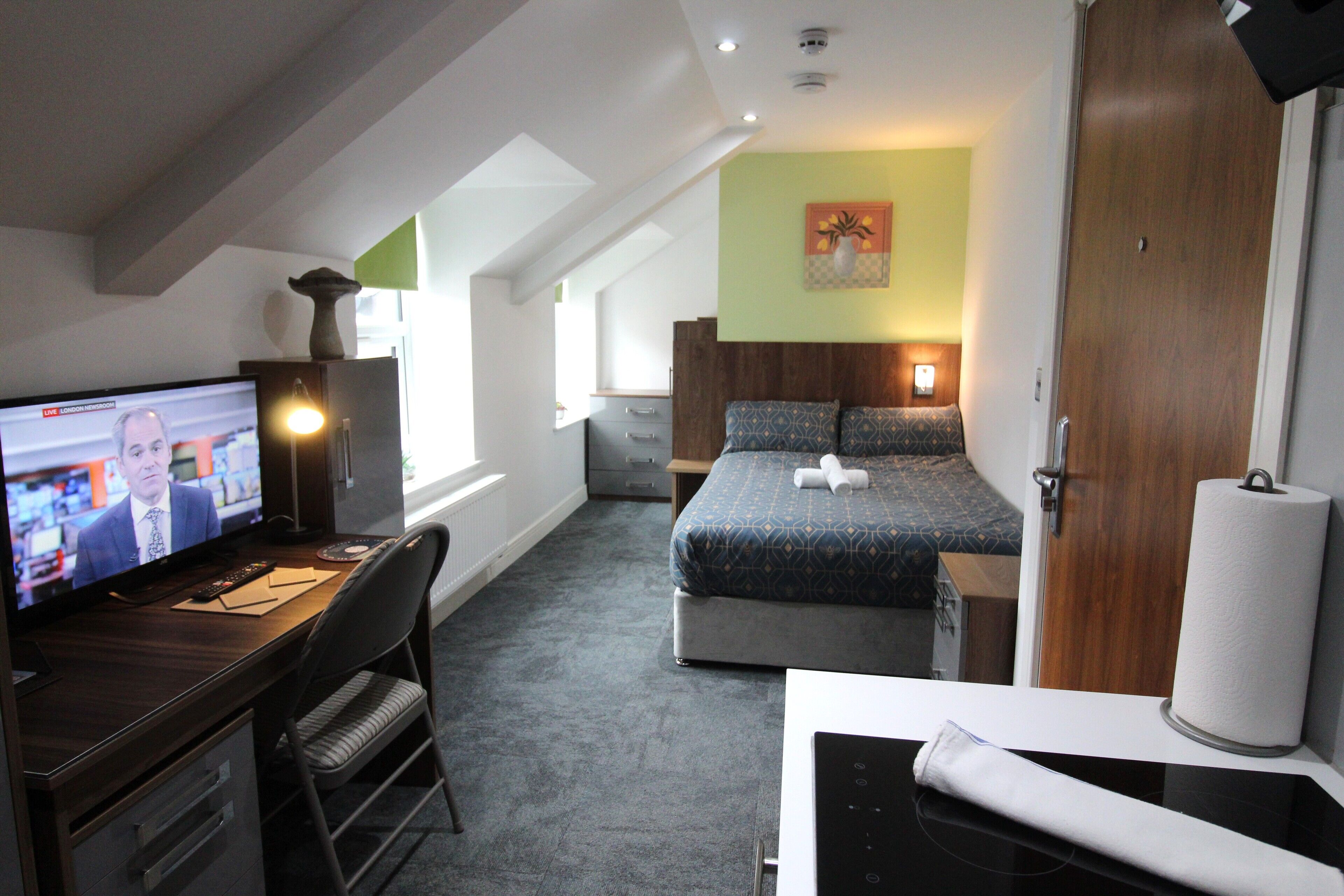 Superior Studio | Premium bedding, down comforters, desk, laptop workspace