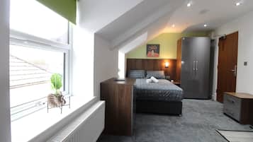 Premium bedding, down duvets, desk, laptop workspace