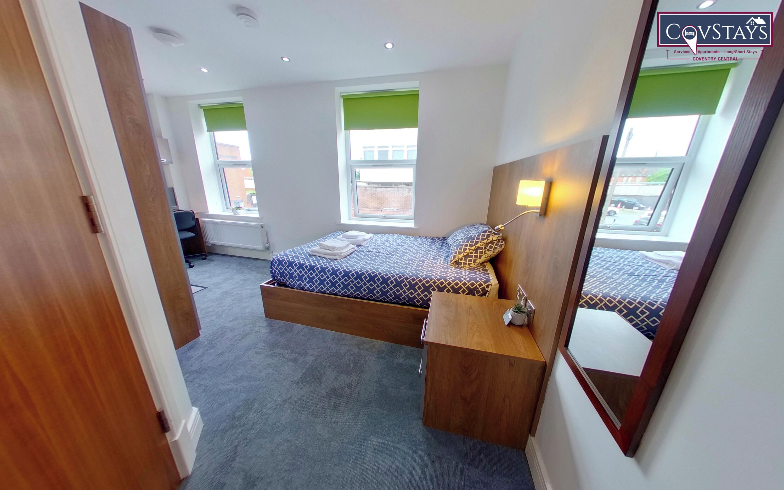 Premium bedding, down comforters, desk, laptop workspace