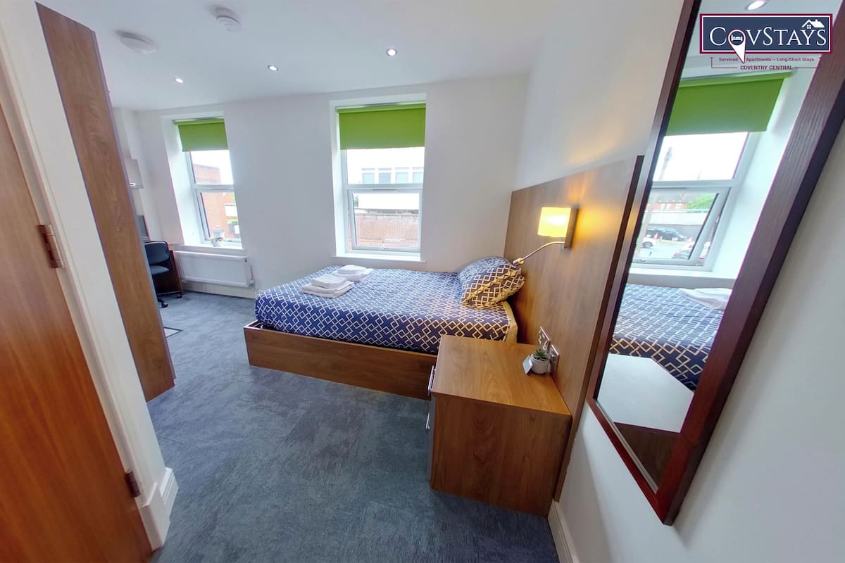 Premium bedding, down comforters, desk, laptop workspace