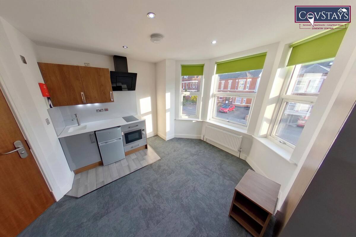 Premium bedding, down comforters, desk, laptop workspace