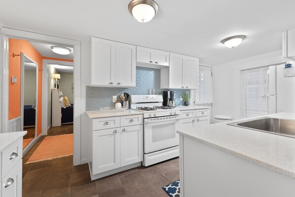 Fridge, oven, coffee/tea maker, toaster