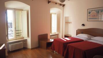 Standard Triple Room, City View | Desk, free WiFi, bed sheets