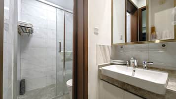 Shower, rainfall showerhead, designer toiletries, hair dryer