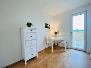 Business Apartment | Tabla de planchar con plancha y wifi gratis