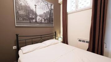 1 chambre, fer et planche Ă repasser, Wi-Fi, draps fournis