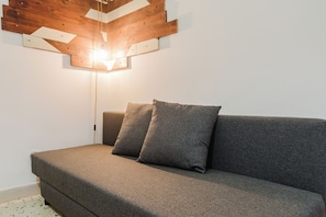 Appartement Deluxe, patio | Coin séjour