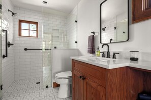 Shower, hair dryer, towels, soap