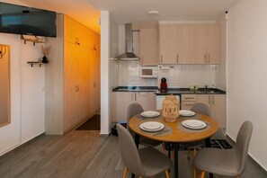 Fridge, microwave, coffee/tea maker, highchair