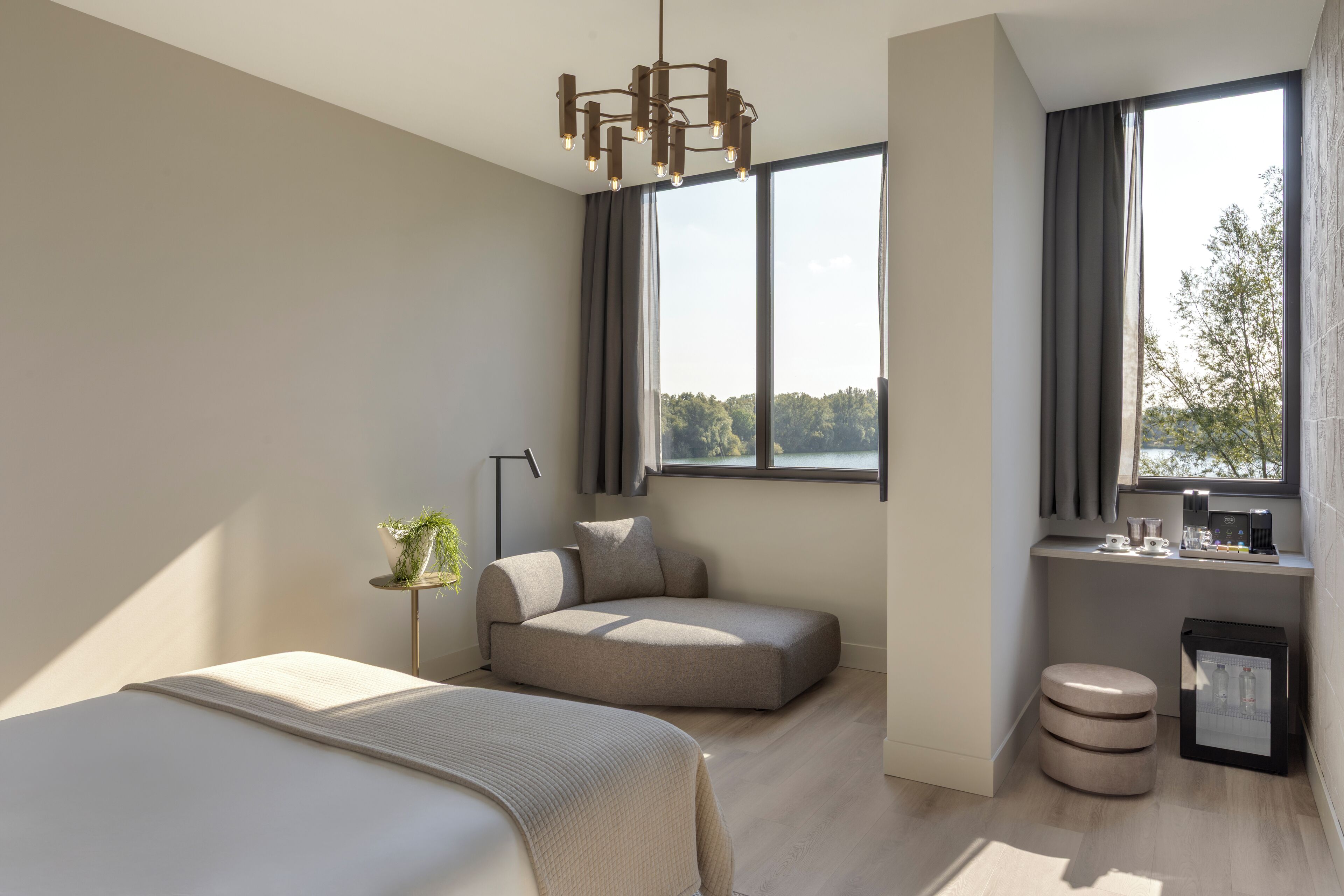 Junior Suite, Lake View | Memory-foam beds, free minibar items, in-room safe, desk