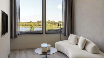 Luxury Suite, Lake View | Memory-foam beds, free minibar items, in-room safe, desk