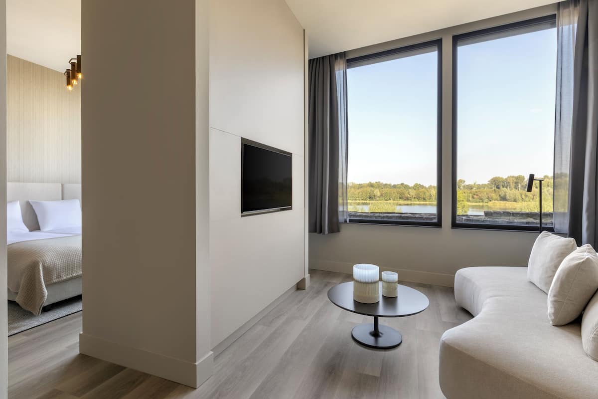 Luxury Suite, Lake View | Memory foam beds, minibar (some free items), in-room safe, desk