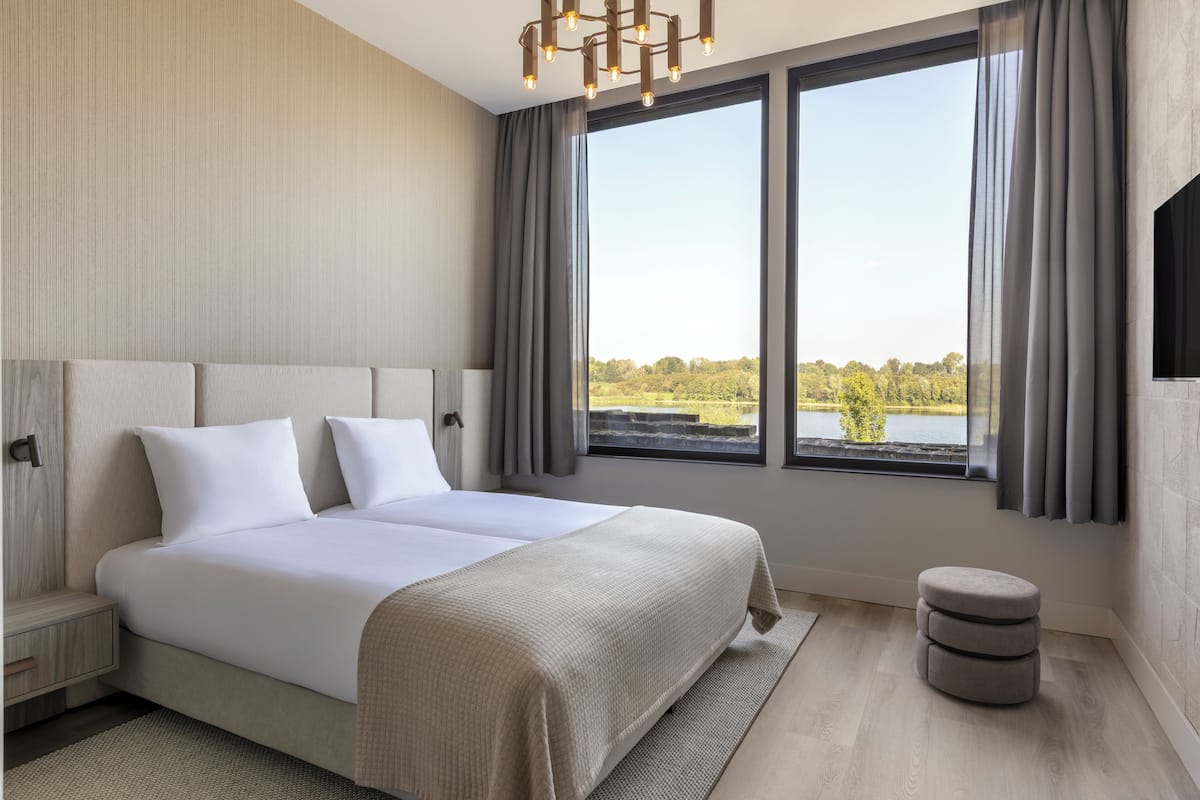 Standard Double Room, Lake View | Memory foam beds, minibar (some free items), in-room safe, desk
