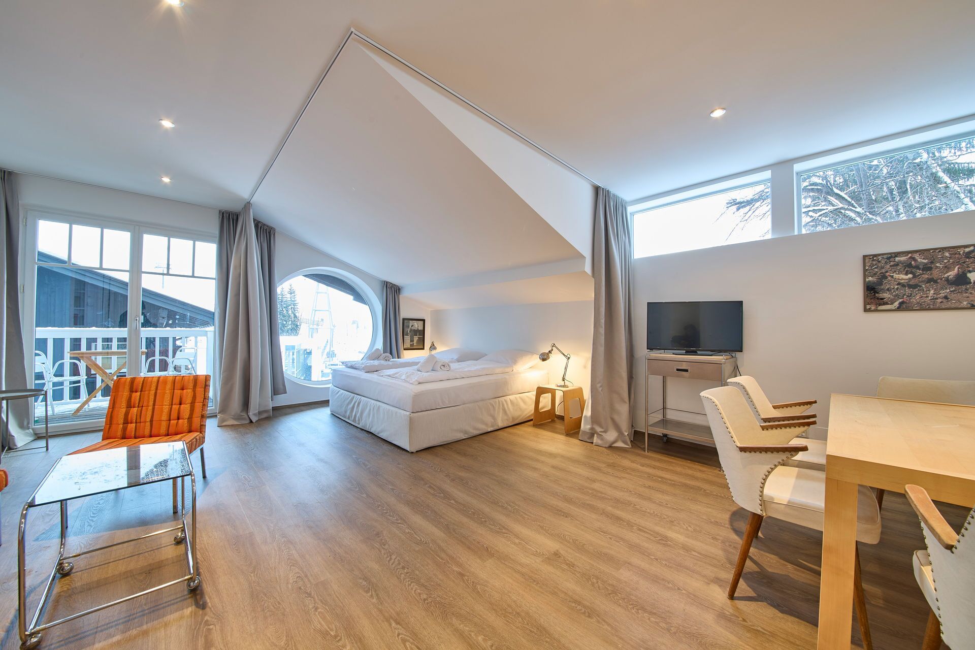 Basic Apartment, 1 Bedroom, Kitchenette, Mountain View | Living area | 50-inch flat-screen TV with cable channels