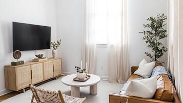 Superior Apartment, 1 King Bed | Living area | 55-inch Smart TV with digital channels