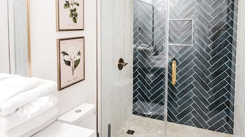 Shower, rainfall showerhead, eco-friendly toiletries, hair dryer