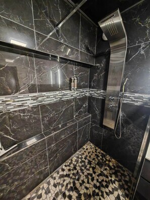 Shower, hair dryer, towels, soap