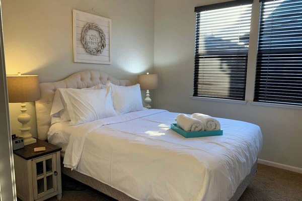 Bed is made with triple sheet method with duvet.