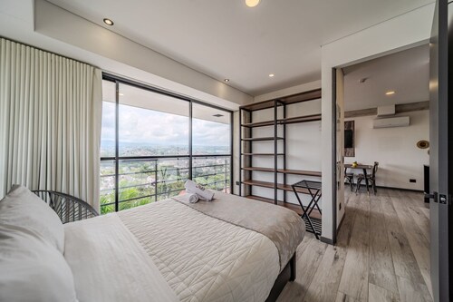 |Ahead| Contemporary 2BR with balcony & parking