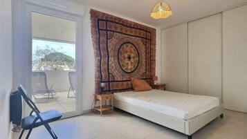 2 chambres, fer et planche à repasser, Wi-Fi, draps fournis